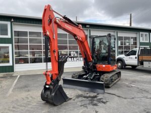 2026 Kubota KX057-5 includes heat, A/C, angle blade, 2X AUX hydraulics, coupler, hydraulic thumb, dig bucket - Image 2