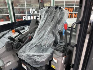 2026 Kubota KX057-5 includes heat, A/C, angle blade, 2X AUX hydraulics, coupler, hydraulic thumb, dig bucket - Image 6