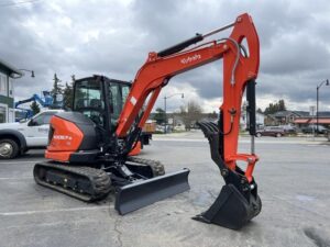 2026 Kubota KX057-5 includes heat, A/C, angle blade, 2X AUX hydraulics, coupler, hydraulic thumb, dig bucket - Image 5