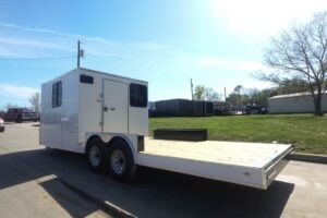 8.5×24 White Hybrid Enclosed V nose (2) 7K axles (2) 30×30 Windows No rails Pintle Hitch
