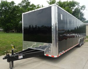 8.5×32 Black Enclosed Car Hauler Trailer With Ramp and Side Door (3) 7K Axles 21k GVWR