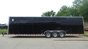 8.5×32 Black Enclosed Car Hauler Trailer With Ramp and Side Door (3) 7K Axles 21k GVWR - Image 6