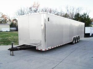 8.5×32 Silver Enclosed Car Hauler Trailer With Ramp and side door (3) 7K Axles 21k GVWR - Image 2