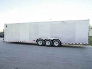 8.5×32 Silver Enclosed Car Hauler Trailer With Ramp and side door (3) 7K Axles 21k GVWR - Image 4