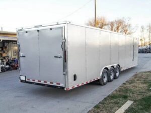 8.5×32 Silver Enclosed Car Hauler Trailer With Ramp and side door (3) 7K Axles 21k GVWR - Image 8