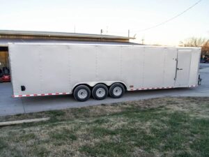 8.5×32 Silver Enclosed Car Hauler Trailer With Ramp and side door (3) 7K Axles 21k GVWR - Image 6