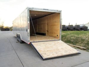 8.5×32 Silver Enclosed Car Hauler Trailer With Ramp and side door (3) 7K Axles 21k GVWR - Image 11