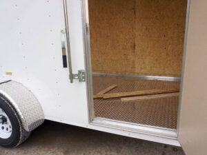 6′ X 12′ White Enclosed V-Nose Trailer with Diamond Plate Floor Storage - Image 21