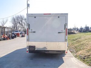 Enclosed Trailer Custom 7’x18′ White Tandem Axle with Ramp and E-Tracks Storage - Image 5
