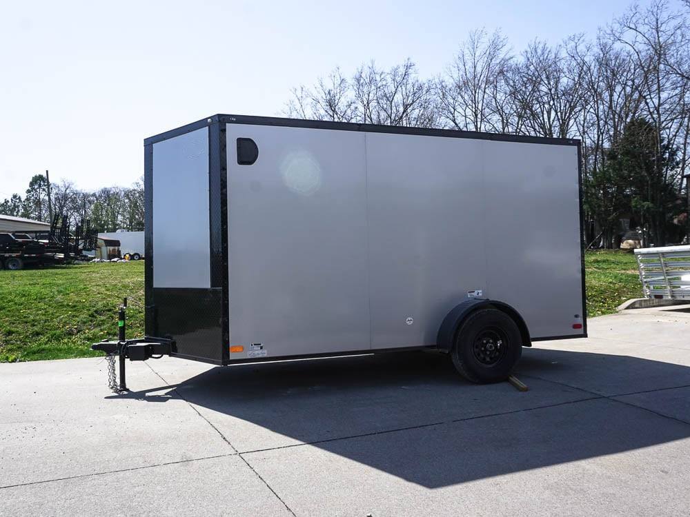 7×12 Enclosed Trailer Silver V-Nose Blackout Package 3,500lb Axle Storage 7×12 Enclosed Trailer Silver V-Nose Blackout Package 3,500lb Axle Storage - Image 1